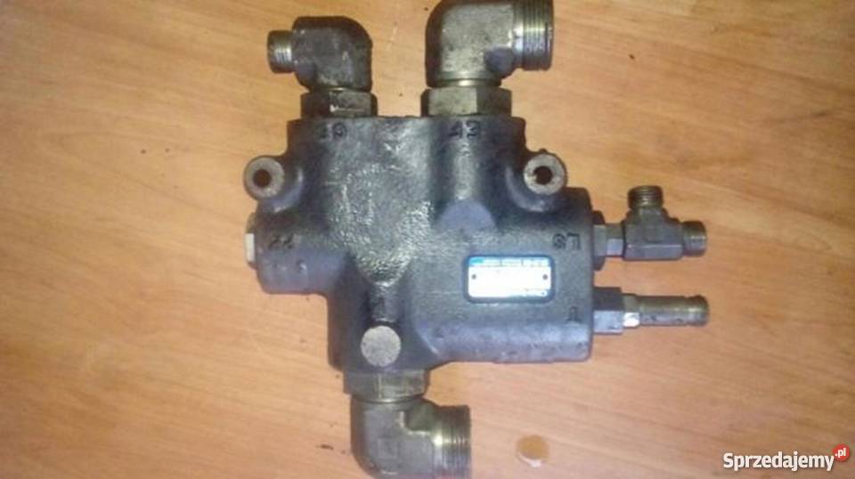 Zawór hydrauliki Holland 867087708970 Ford seria Siemiatycze