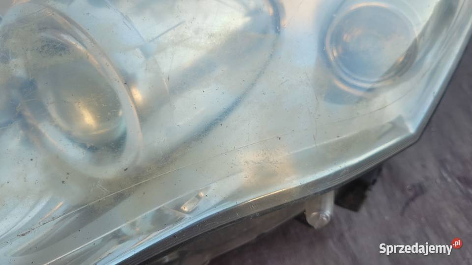 RENAULT LAGUNA III 0710 REFLEKTOR LEWY LAMPA Ruda Śląska