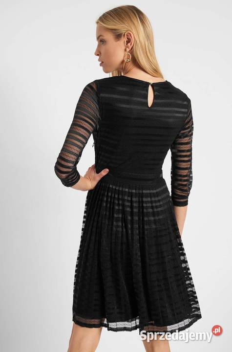 Rozkloszowana sukienka w paski czarna mazowieckie Warszawa