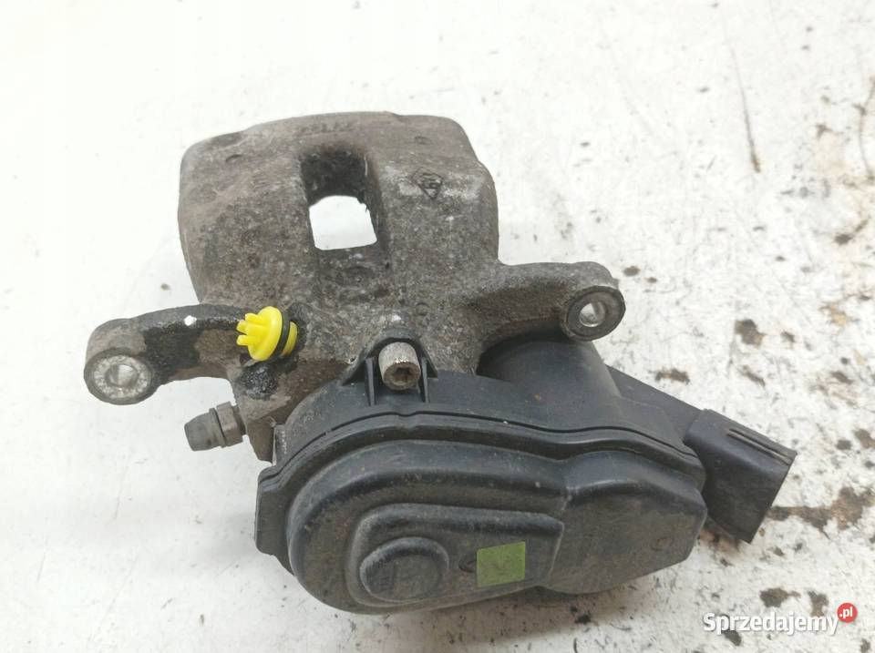 ZACISK HAMULCOWY LEWY TYŁ ELEKTRYCZNY 16 DCI świętokrzyskie