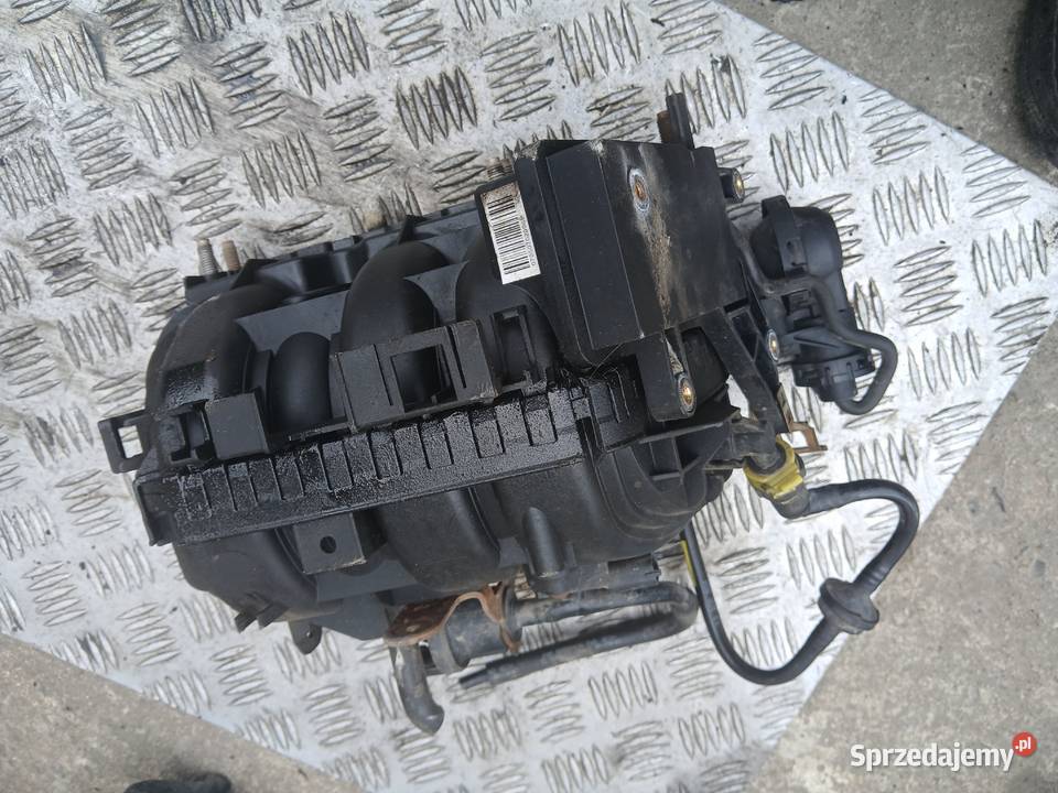 Kolektor ssący 55557905 Opel 1012V Z10XEP