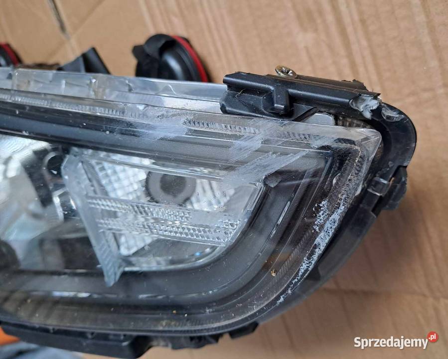 Uszkodzony reflektor lampa 92102 G4060 prawy Łódź