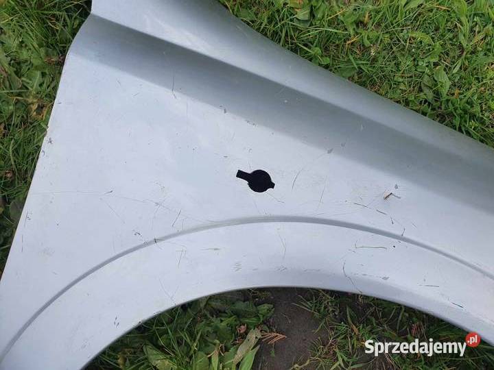 Błotnik prawy srebrny opel Astra G 9809 z osobowe Błotniki małopolskie Kraków