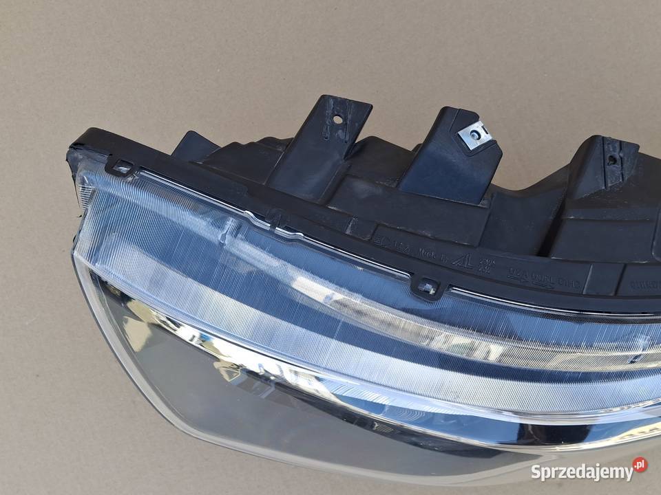 IVECO DAILY 14 REFLEKTOR LEWY ORYGINAŁ LAMPA osobowe Bieleń