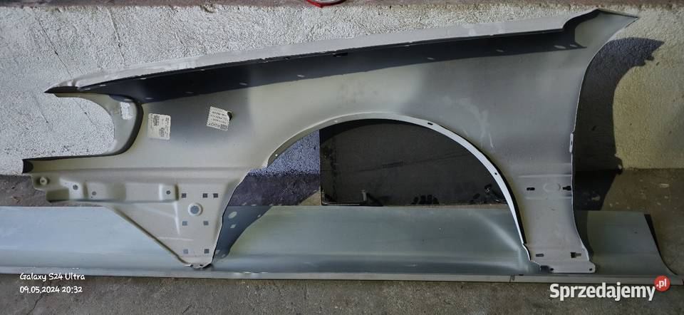 Audi 100 C4 9194 błotnik przedni nowy osobowe Części samochodowe Chełmno