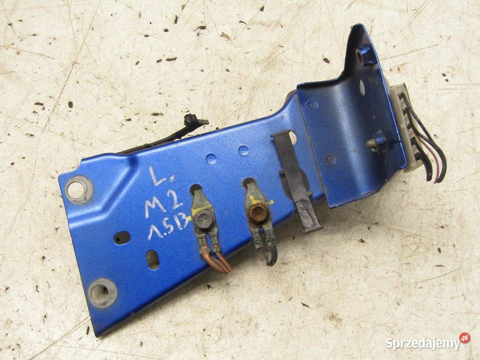 MOCOWANIE BŁOTNIKA LEWY PRZÓD 44J MAZDA 2 DJ Błotniki