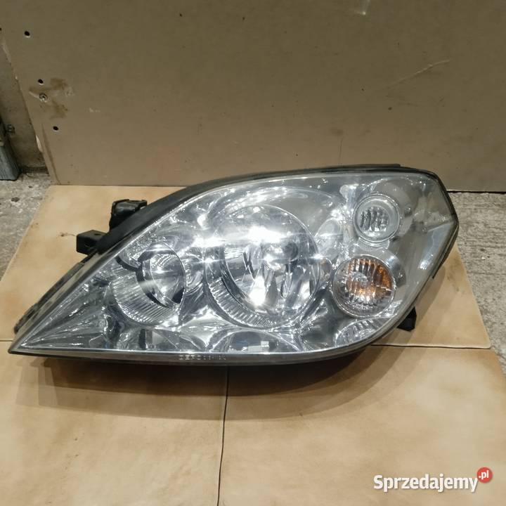 Nissan Primera P12reflektor lewy orginal Wrocław