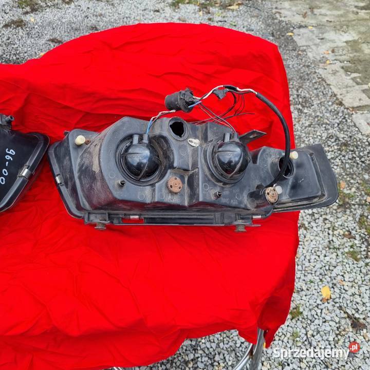 dwie lampy soczewka black tuning vw passat b5 Brzeg
