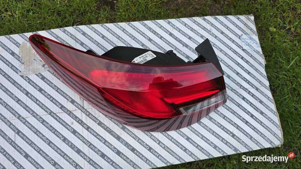 Lampa tył Astra J 25870153 Sedan