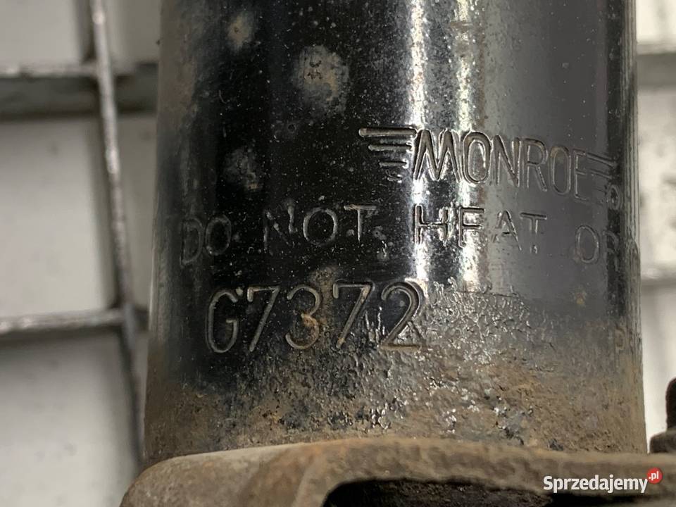 AMORTYZATOR PRAWY PRZÓD ZE SPRĘŻYNĄ DACIA DUSTER