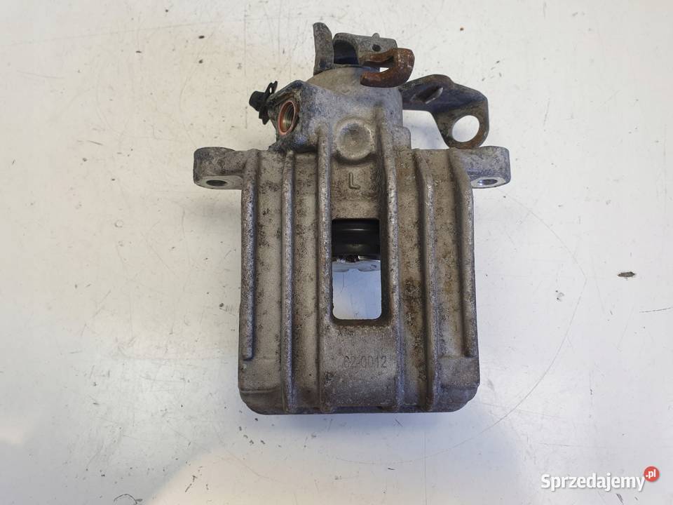 VW Golf IV LEWY ZACISK HAMULCOWY tył KIEROWCY Układ hamulcowy