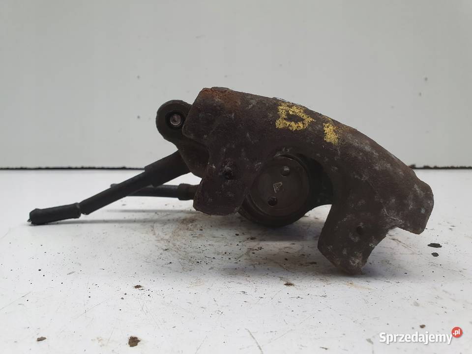 Volvo V40 II TYLNY ZACISK HAMULCOWY lewy tył Chełm sprzedam