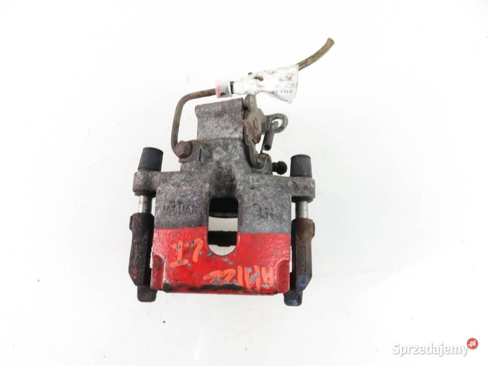 ZACISK LEWY TYŁ JAGUAR XF X250 27 TDV6 małopolskie