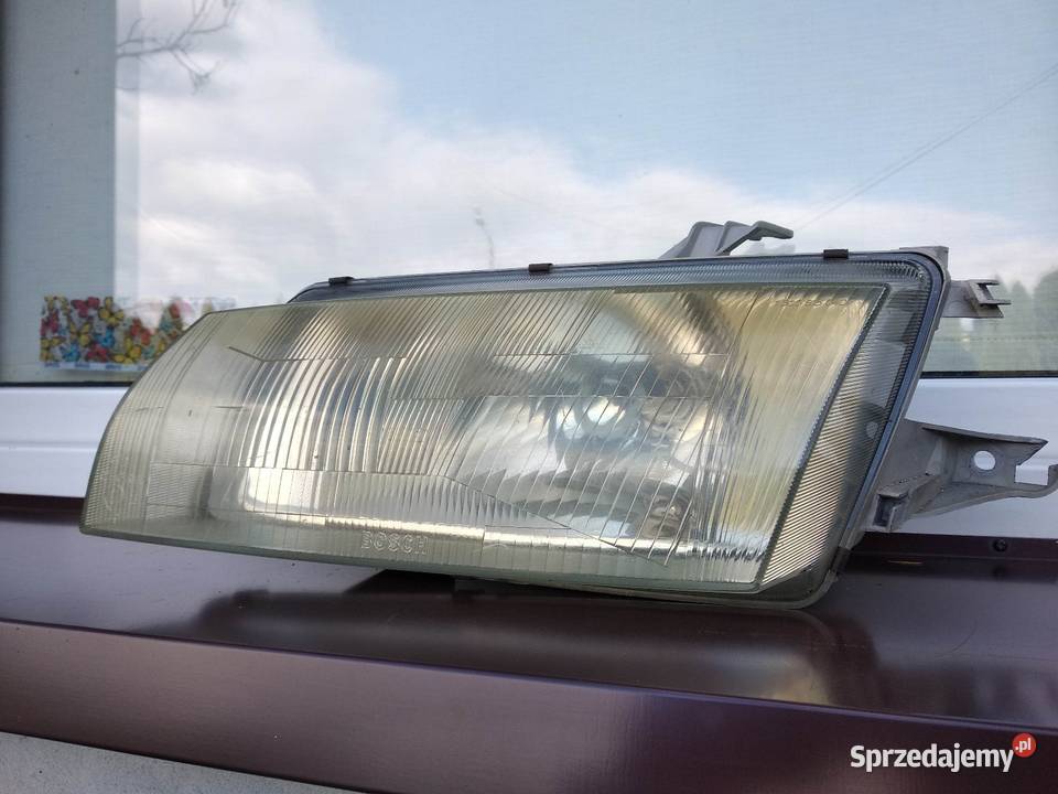 Mazda 323p BA lampa przednia lewa reflektor Lampy przednie łódzkie Sieradz