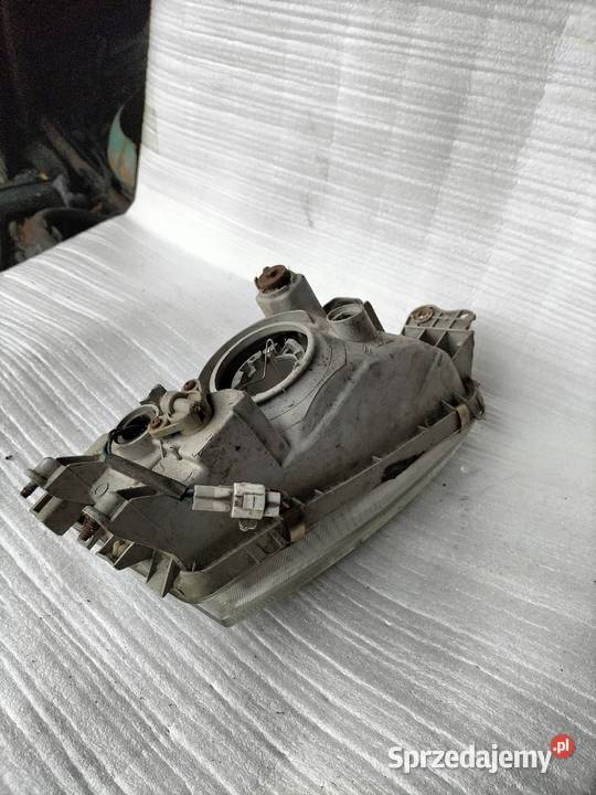 LAMPA PRZEDNIA PRZÓD LEWA MITSUBISHI COLT 5 9698 Oświetlenie Kamień-Kolonia