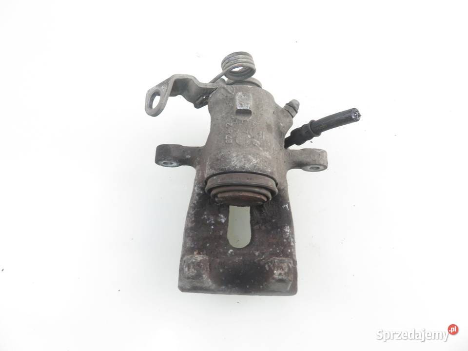 ZACISK LEWY TYŁ OPEL MERIVA B MPV S10 14 A 14 Zaciski i jarzma
