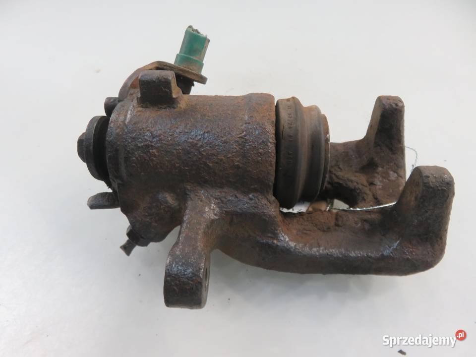 ZACISK LEWY TYŁ RENAULT KANGOO Express II