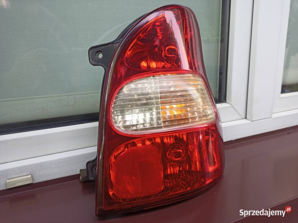 Kia Carnival I 1 lampa tył tylna prawa Oświetlenie Sieradz