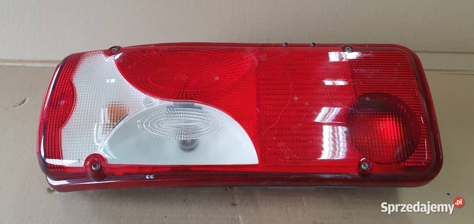 MAN SPRINTEL LAMPA TYŁ ORYGINAŁ LEWA dostawcze Bieleń