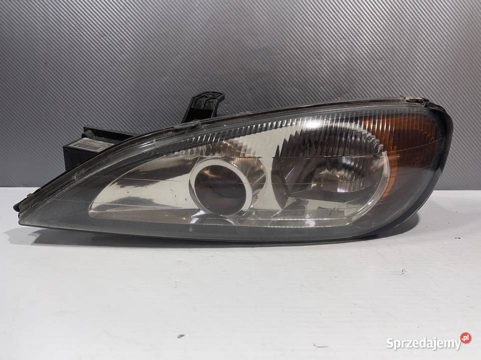 NISSAN PRIMERA P11 LEWA LAMPA PRZÓD Ostroróg