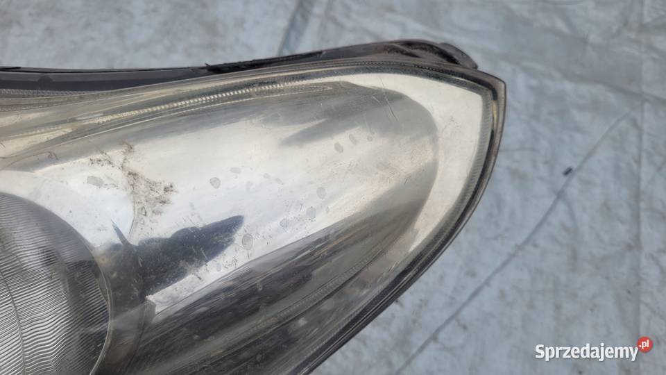 SUZUKI ALTO 0914 LEWY REFLEKTOR LAMPA LEWA PRZOD