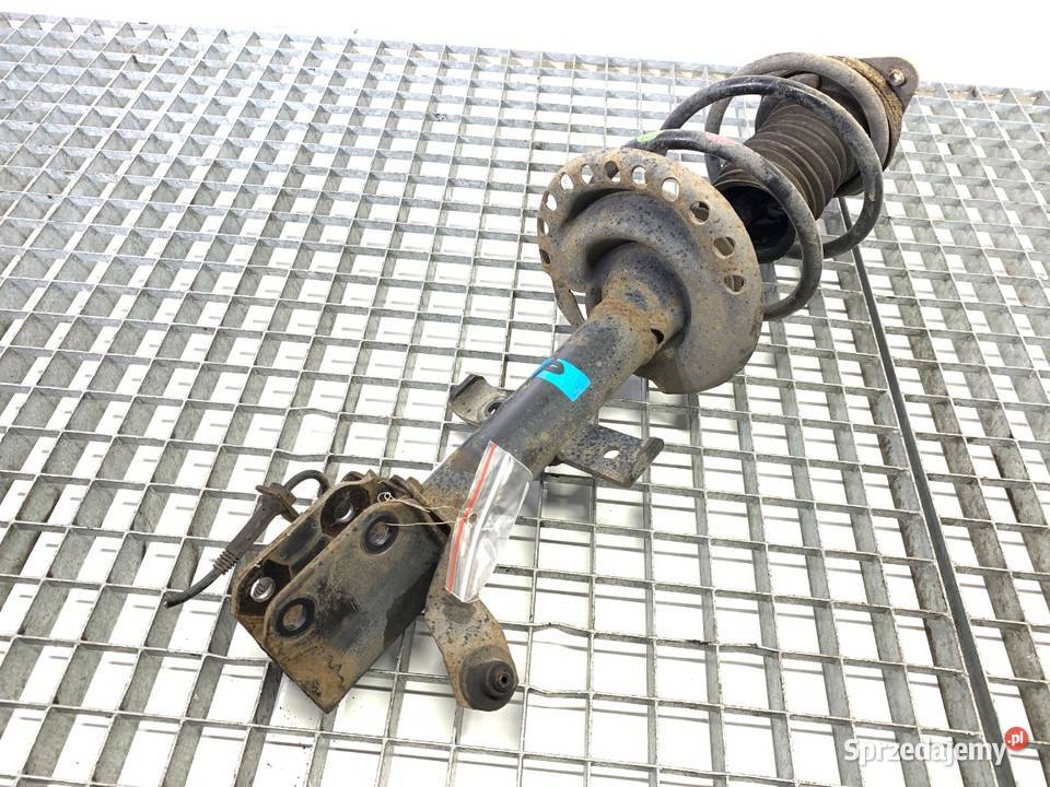 AMORTYZATOR PRAWY PRZÓD ZE SPRĘŻYNĄ RENAULT Amortyzatory