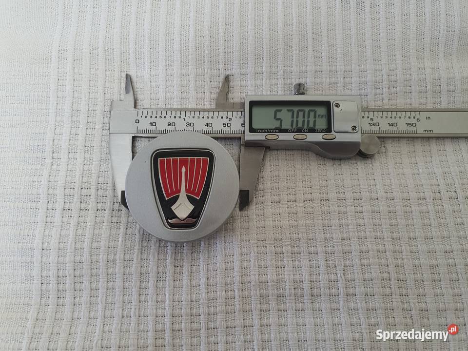 NOWY DEKIELEK POLIFT Z EMBLEMATEM 57mm DTC000150 Poznań sprzedam