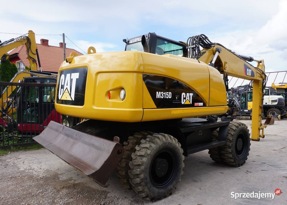 Koparka kołowa CAT M 315 D 2009 Jeziorko