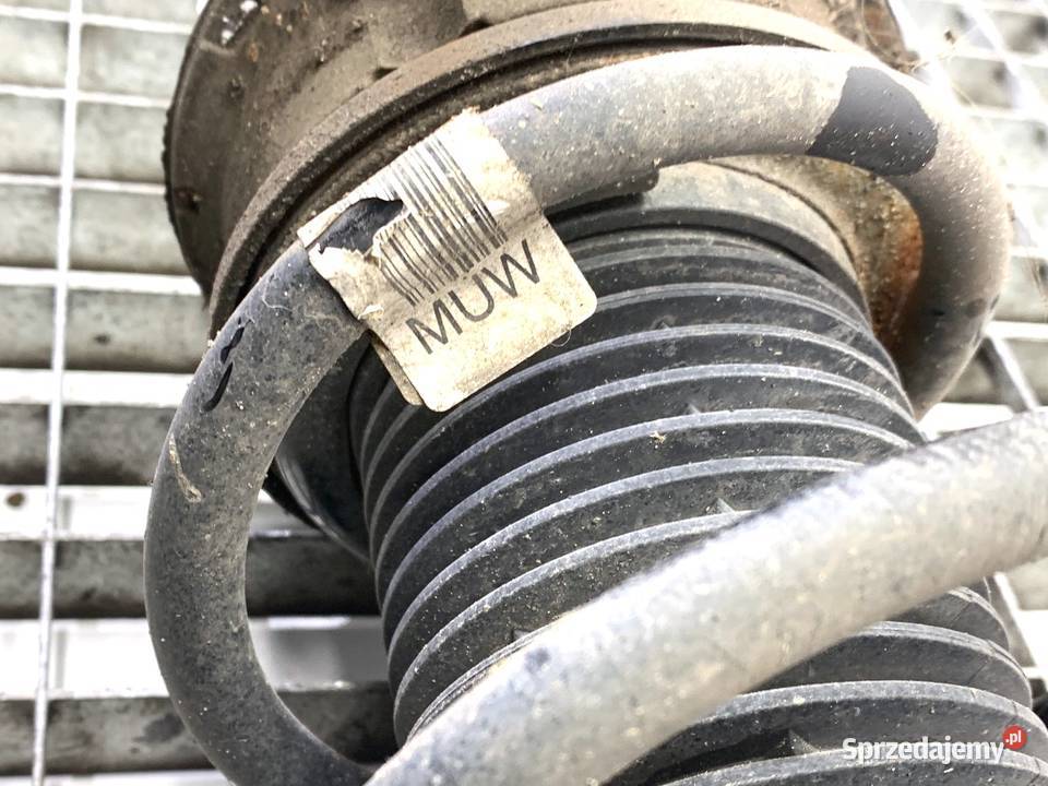 AMORTYZATOR LEWY PRZÓD ZE SPRĘŻYNĄ SKODA SUPERB