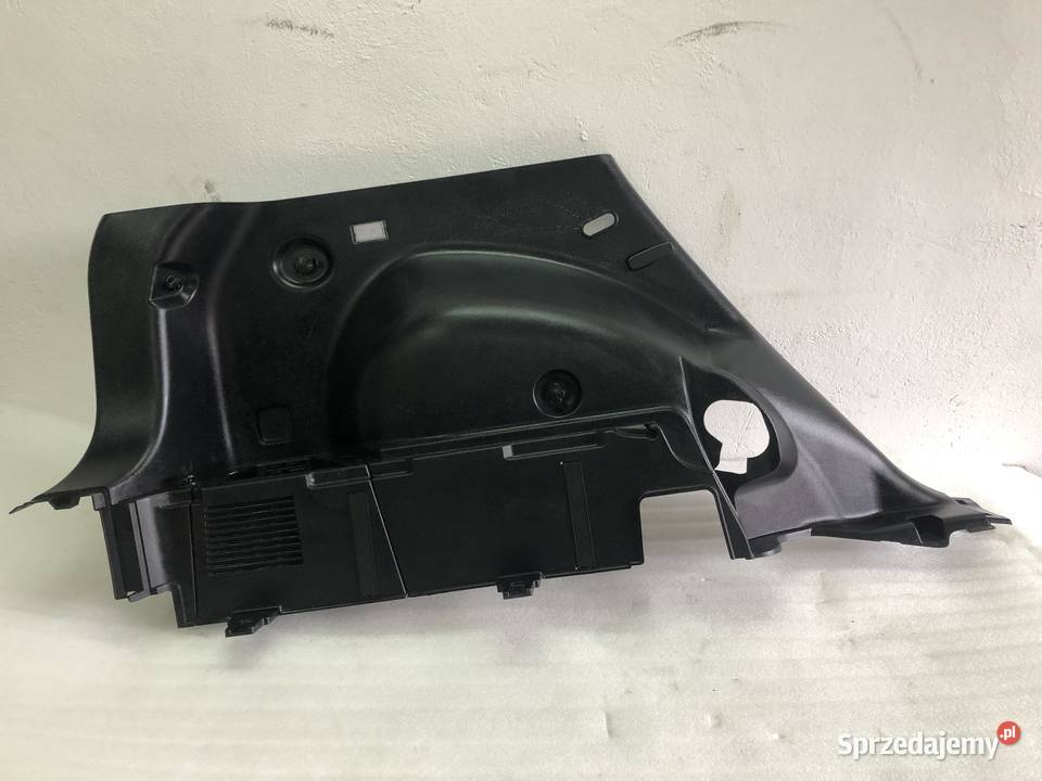 BOCZEK BAGAŻNIKA 857303U000 LEWY KIA SPORTAGE