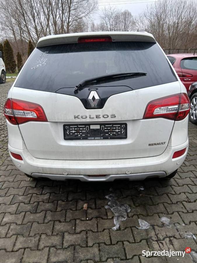 Lampa tylna tył Renault Koleos 2010 lewa w klapę Szczerbice