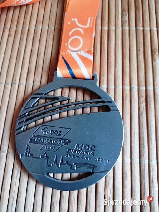 Medal koszulka Voltaren 10k 2024 DOZ maraton Skierniewice
