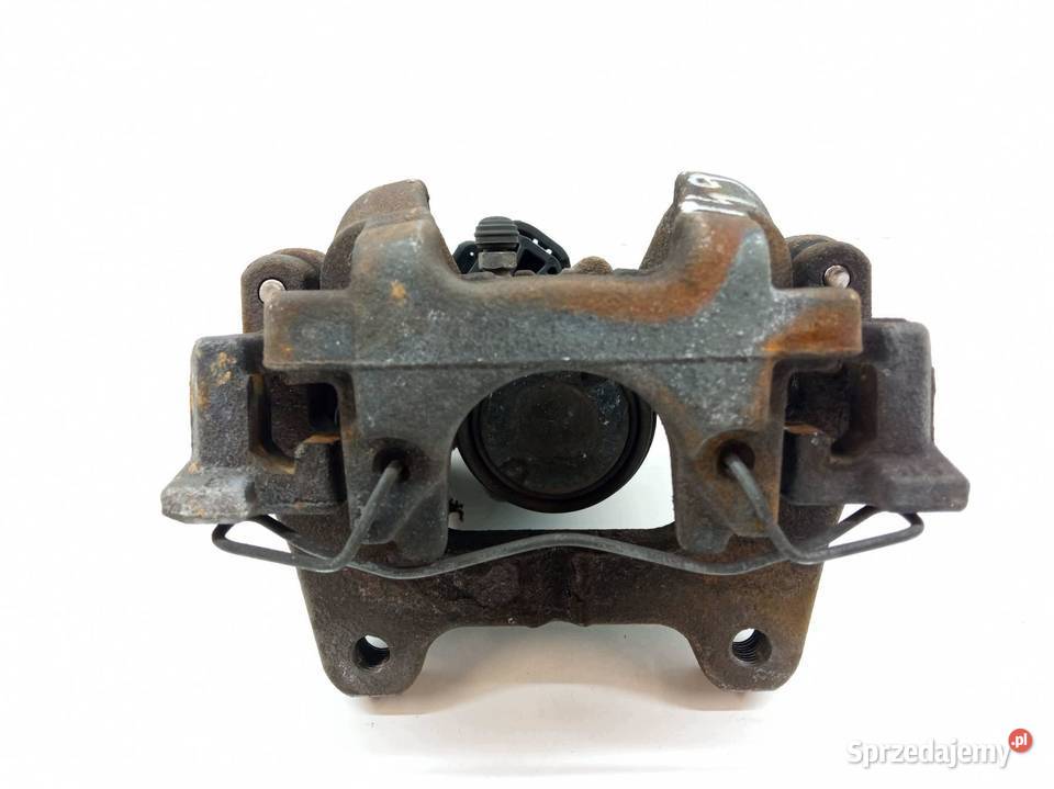 ZACISK HAMULCOWY PRAWY TYŁ T8 31687559 Volvo XC