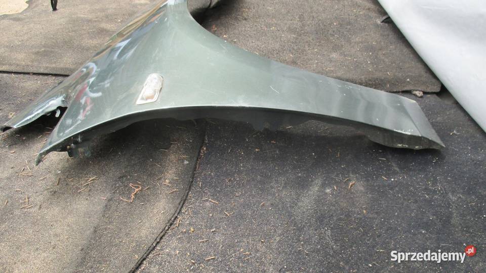 OPEL ASTRA J IV 10r błotnik prawy przód