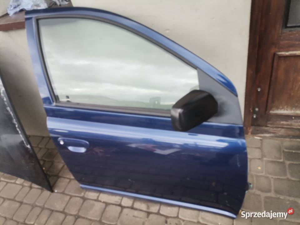 DRZWI PRAWY PRZÓD TOYOTA YARIS 1 8K8 Nowy Sącz