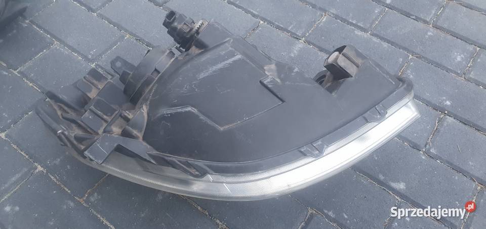 FIAT SEDICI SUZUKI SX4 lampa przód lewa WYSYŁKA