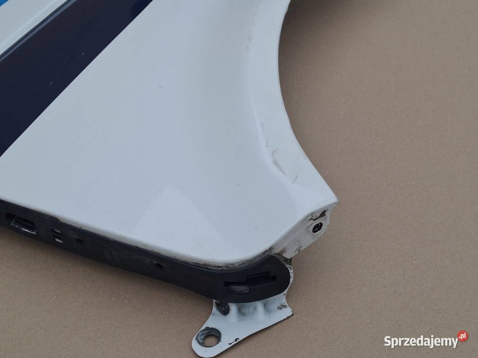 VW T5 0315 BŁOTNIK LEWY PRZÓD PRZEDNI ORYGINAŁ Części samochodowe