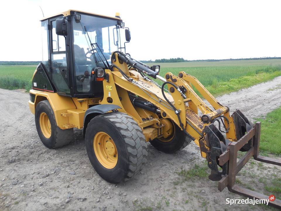 Ładowarka przegubowa Caterpillar CAT 906 7340 Rok produkcji 2005