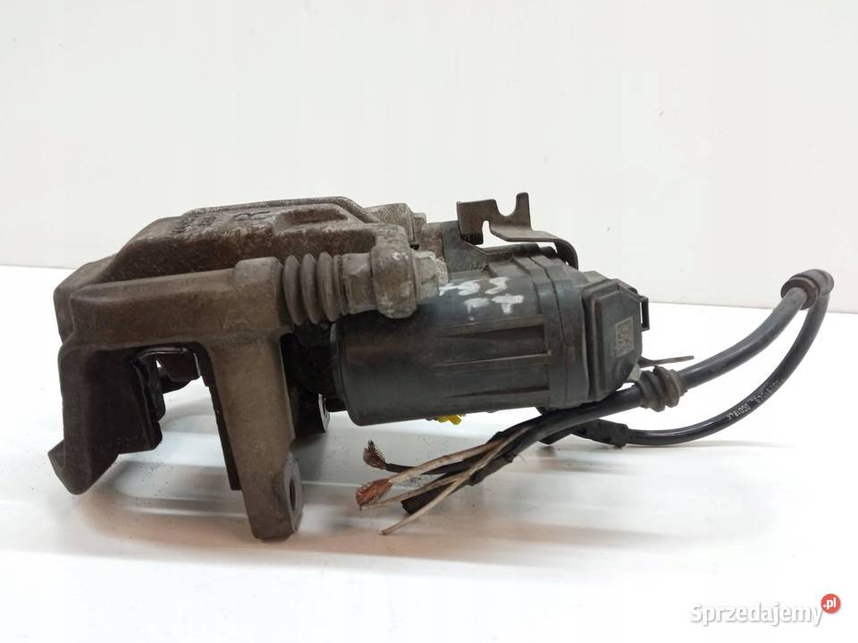 ZACISK HAMULCOWY PRAWY TYŁ ELEKTRYCZNY 4030020
