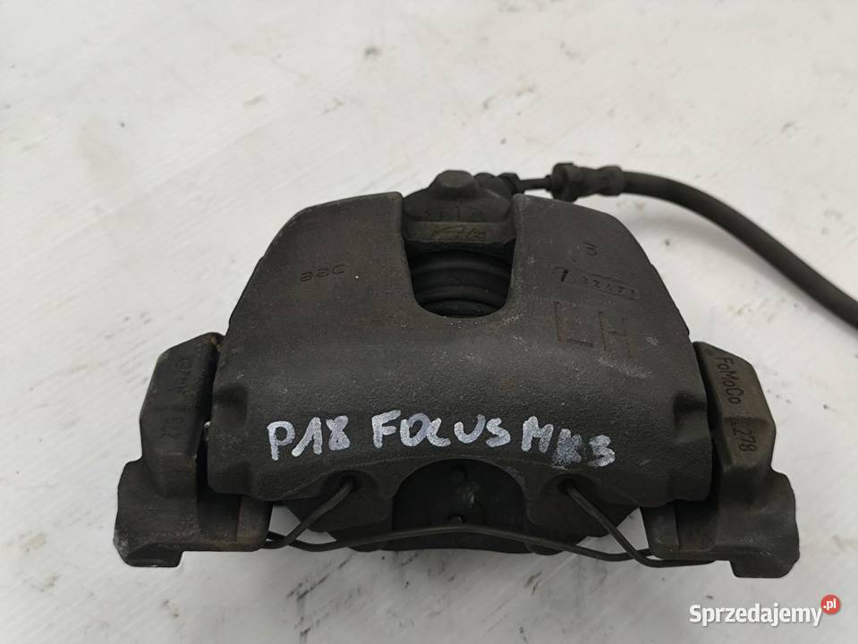 ZACISK LEWY PRZÓD FORD FOCUS MK3 LIFT 15 TDCI