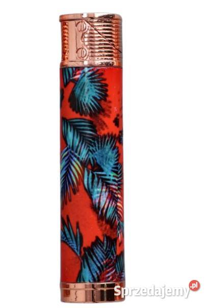 Zapalniczka Żarowa Czerwone tło turkusowe liście Pozostałe Ostrowy nad Okszą