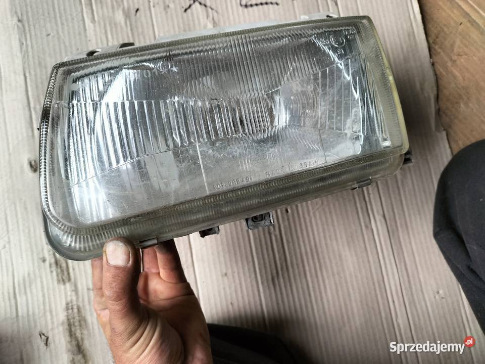 LAMPA PRZÓD LEWA REFLEKTOR VW POLO 6N Oświetlenie Kamień-Kolonia