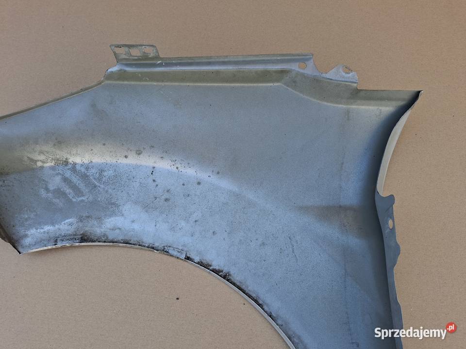 FORD FIESTA VII MK 7 BŁOTNIK PRAWY PRZÓD Bieleń