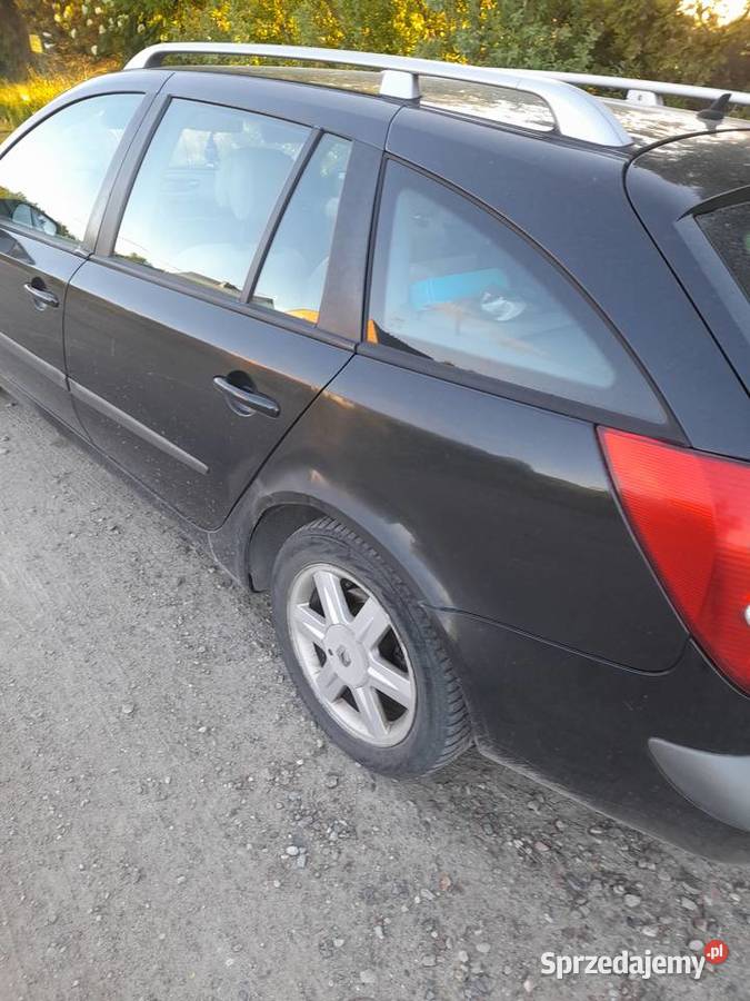 Syndyk sprzeda samochód Renault Laguna kombi Puck