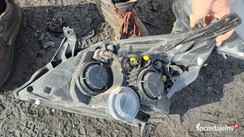 Reflektor lampa lewa prawa przód przednia Opel Książ Wielkopolski
