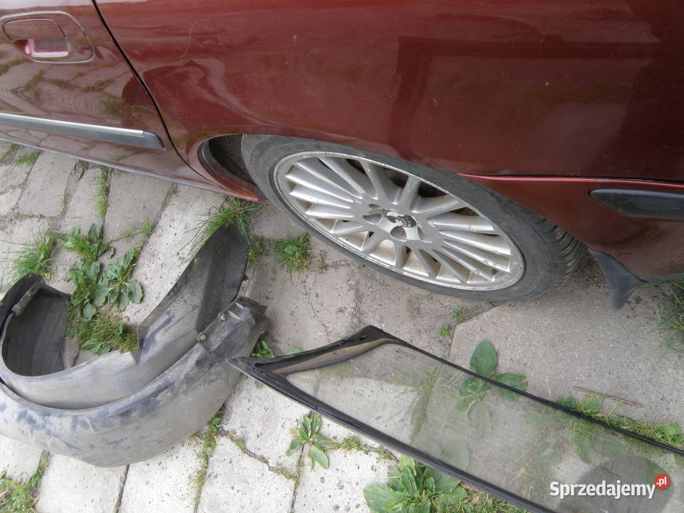 Szyba tylna tył klapy tylnej Opel Astra f 9102