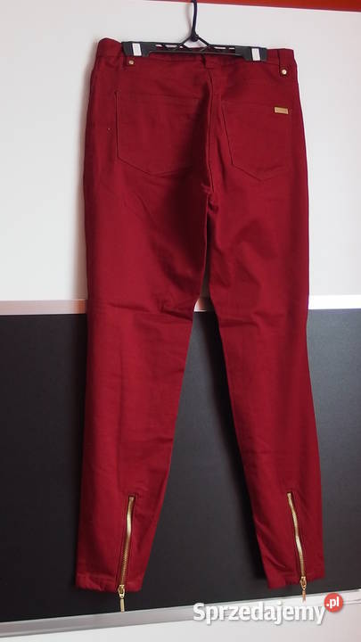 burgundowe spodnie rurki HM xs 34 złote zamki czerwony Toruń
