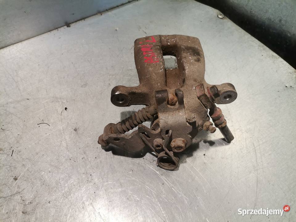 ZACISK HAMULCOWY LEWY TYŁ OPEL ASTRA III H 19 Nowy Sącz