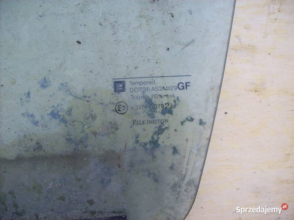 Astra II G Szyba drzwi lewy przod przednia lewa