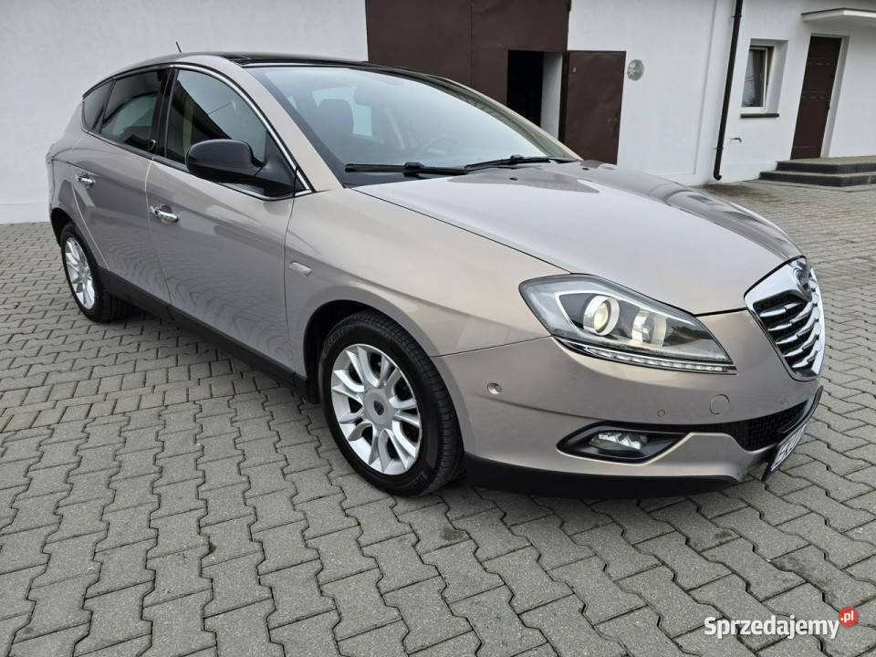 Lancia Delta 14Turbo Benz NavigacjaKlimatr 2 gniazdo USB Kutno